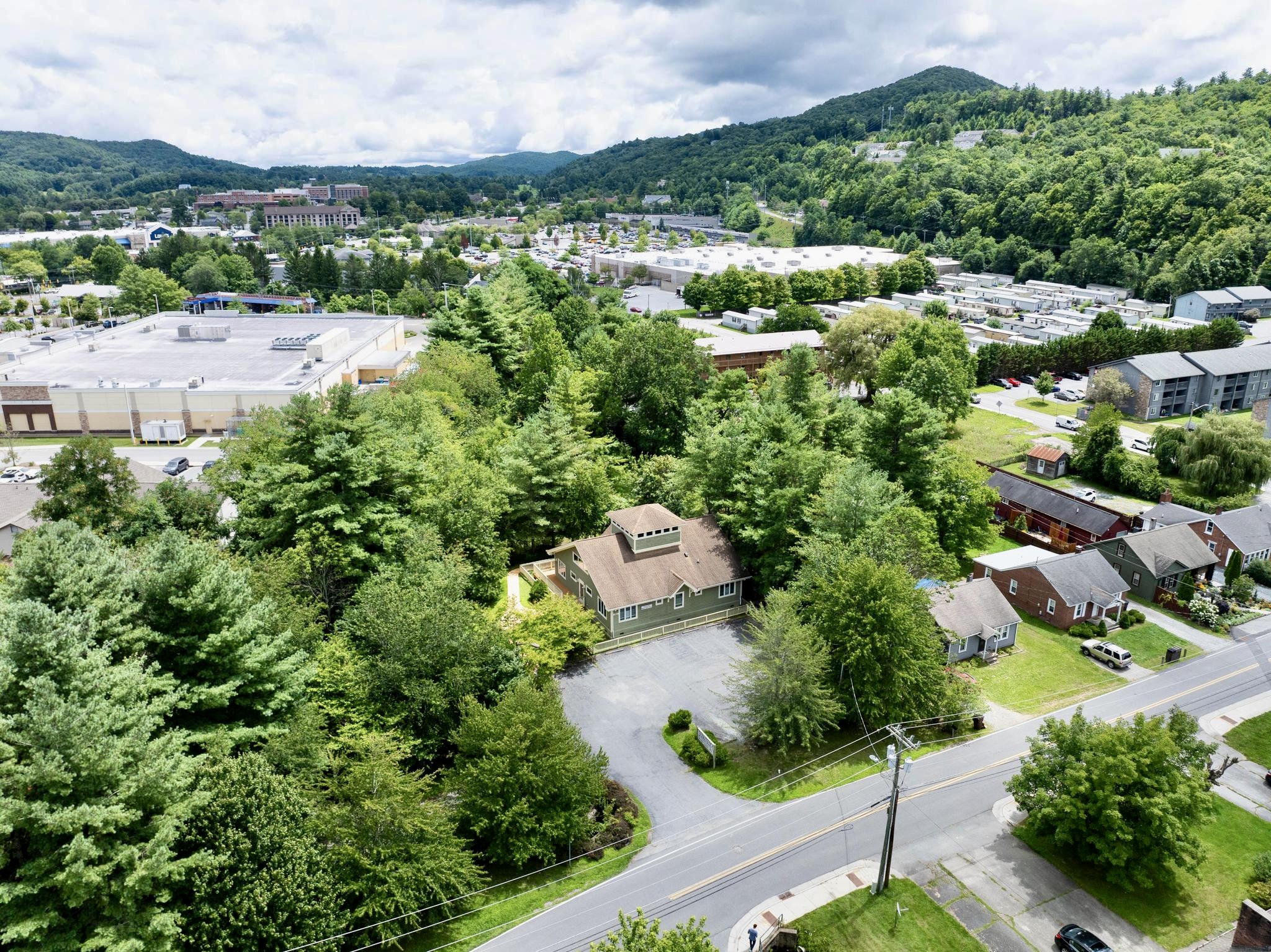 Aerial view of neighborhood and nearby shopping