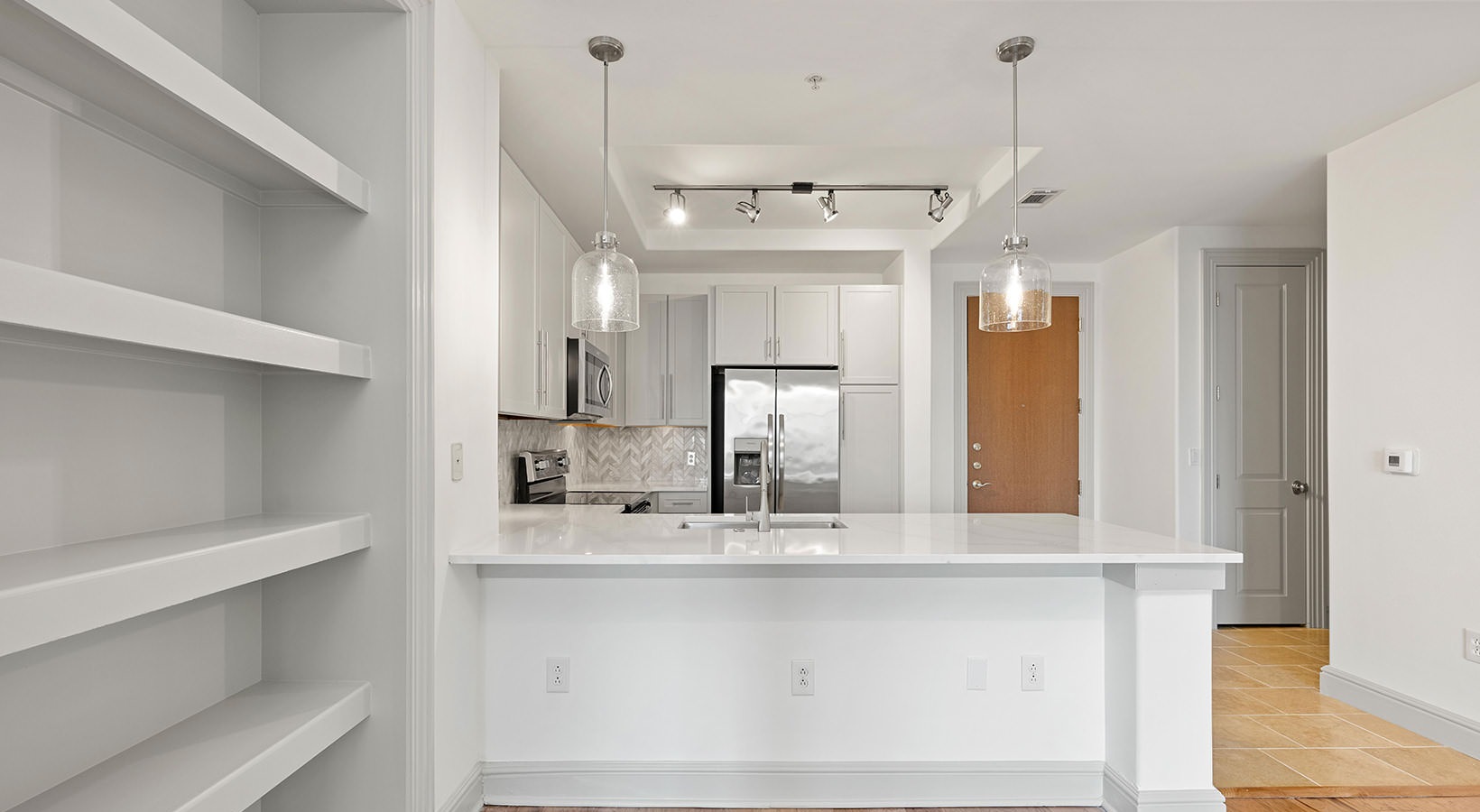 Modern gourmet kitchen with stainless steel appliances