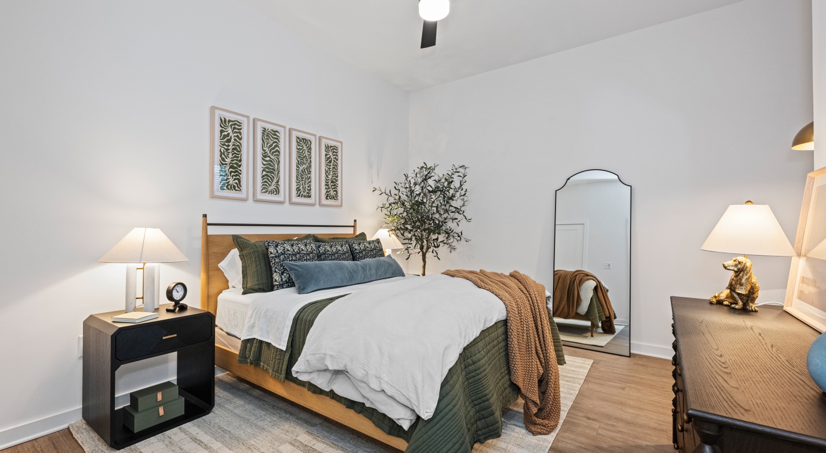Modern bedroom with hardwood floors and contemporary design