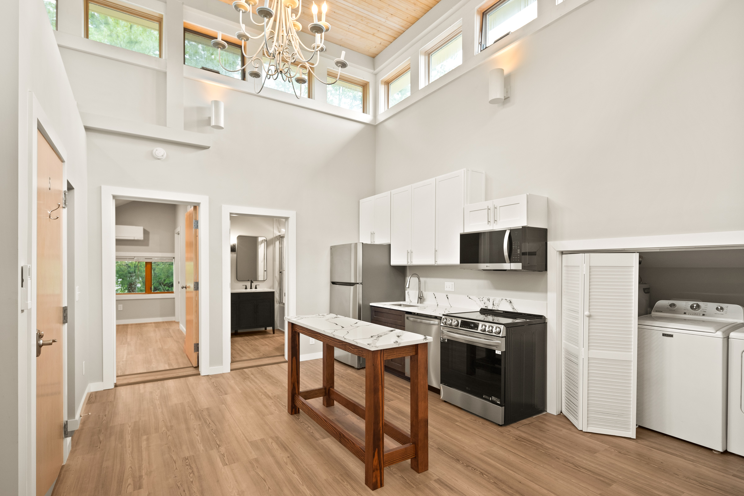 Unit 201 - Kitchen and chandelier